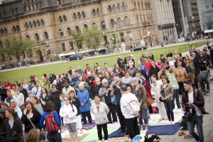 Hundreds of people particpated in a mass blanket exercise on the steps of Parliament Hill, lead by members of Kairos. Members of First Nations communities, faith communities and many others participated including those from Mennonite churches and MCCer's from across the system.